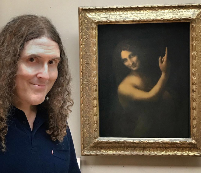 Weird Al posing with his doppelgänger.