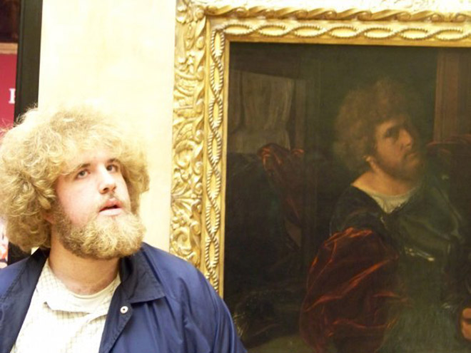 Bearded guy and his painting double.
