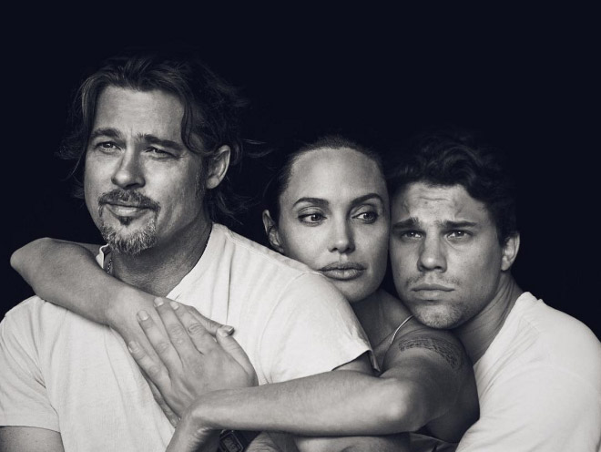 Hugging Brad and Angelina.