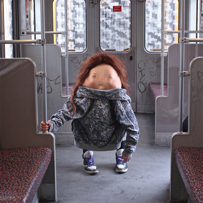 Creepy body art creature in the bus.