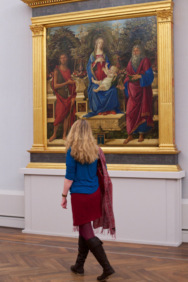 Woman perfectly matching a painting.