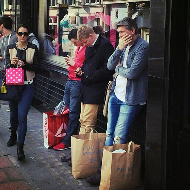 Miserable husbands trapped in the shopping hell.