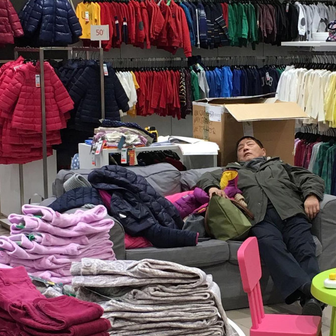 Poor man trapped in the shopping hell.