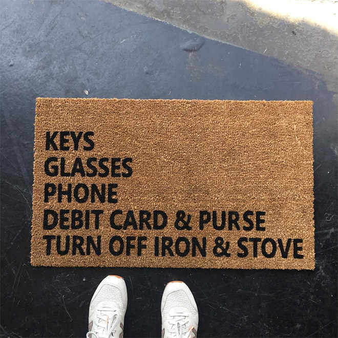 Clever doormat with a reminder.