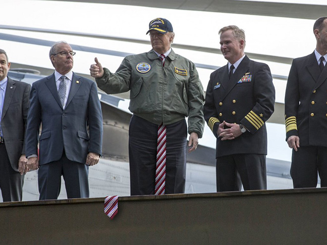 People are photoshopping Trump with extremely long tie to annoy him.