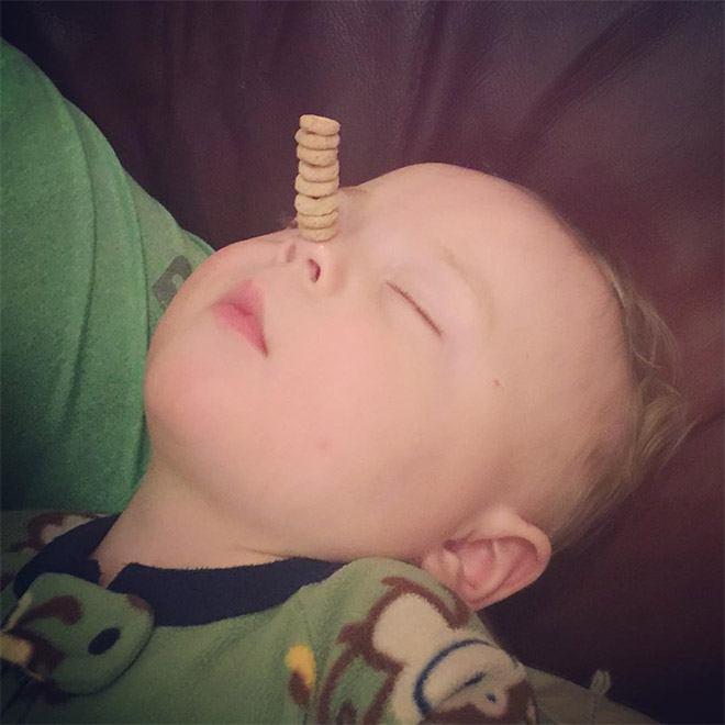 Weird viral trend: stacking Cheerio on babies.