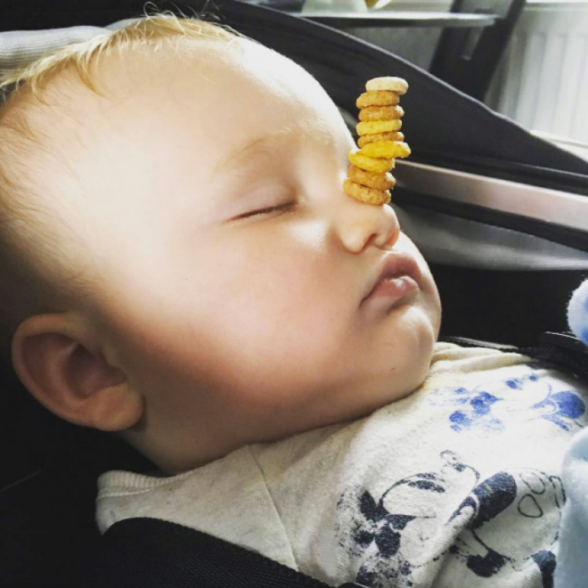 Weird viral trend: stacking Cheerio on babies.