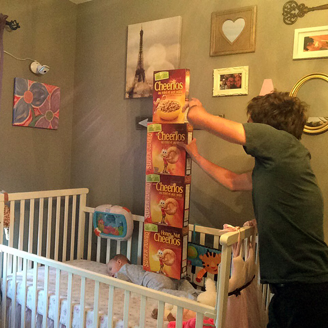 Weird viral trend: stacking Cheerio on babies.