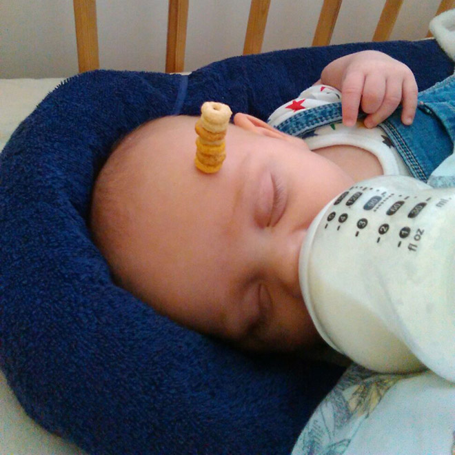 Weird viral trend: stacking Cheerio on babies.