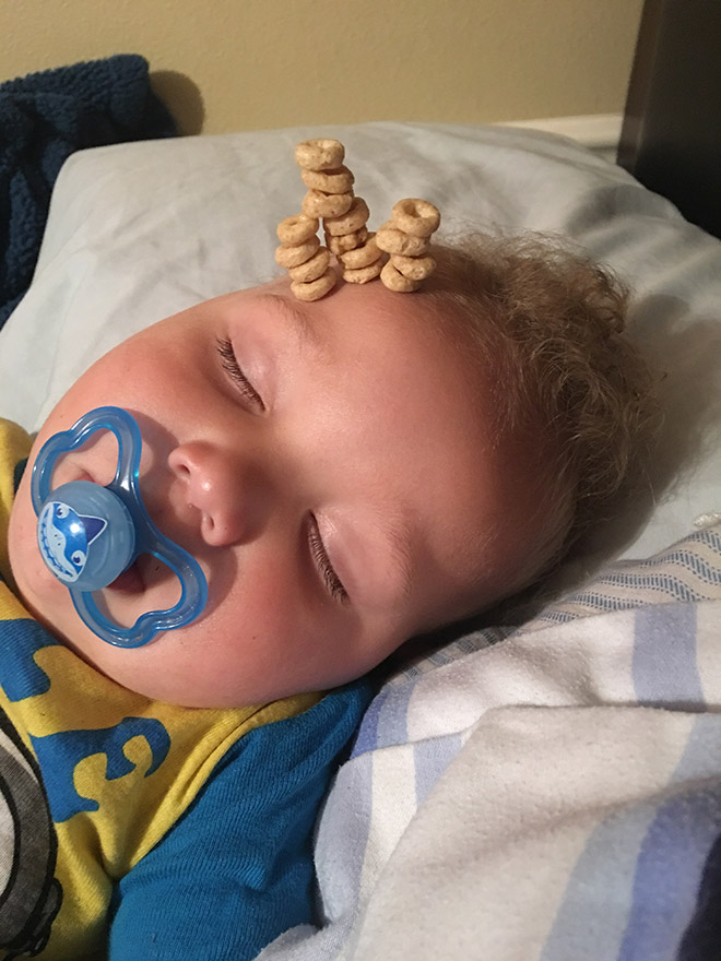 Weird viral trend: stacking Cheerio on babies.