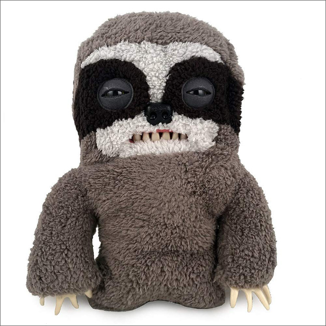 Meet a Fuggler: creepy stuffed toy with human teeth.