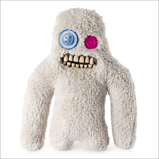 Meet a Fuggler: creepy stuffed toy with human teeth.