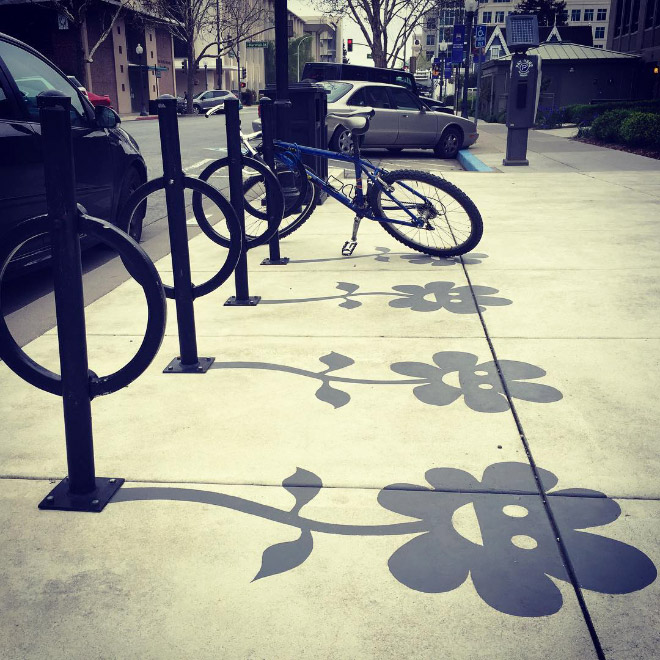 Fake shadow painted by a street artist to confuse people.