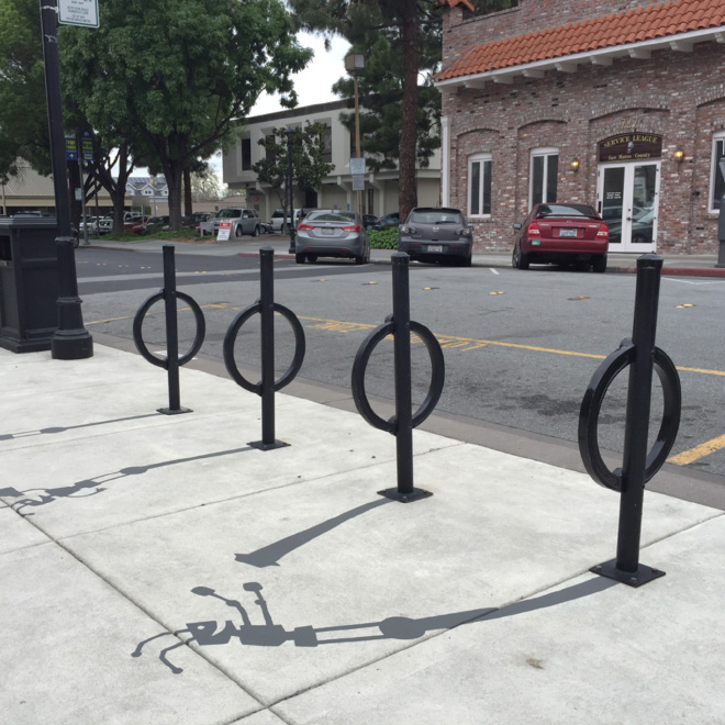 Fake shadow painted by a street artist to confuse people.