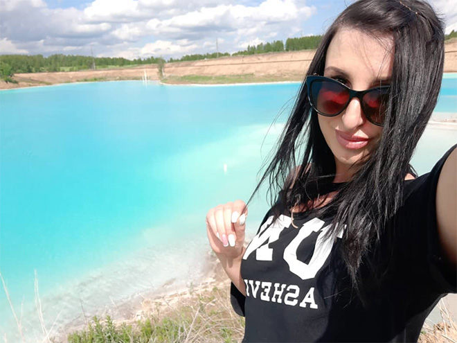 Selfie near a toxic lake.