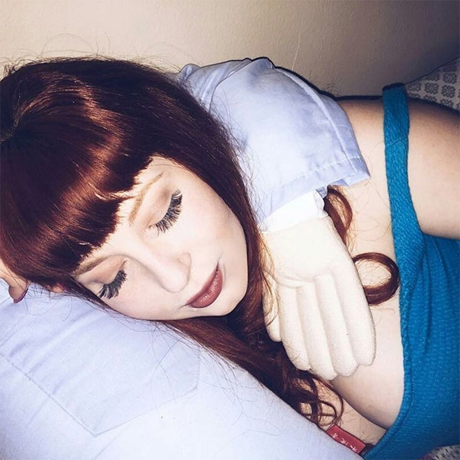 Lonely woman with a "boyfriend pillow".