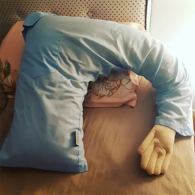 Lonely woman with a "boyfriend pillow".