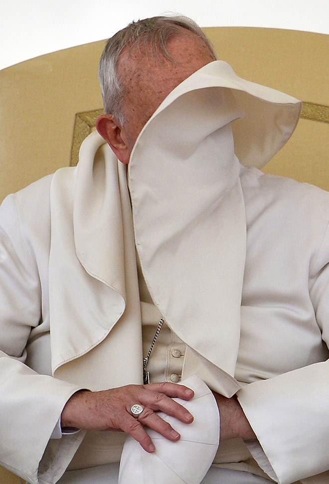 Pope vs. wind.