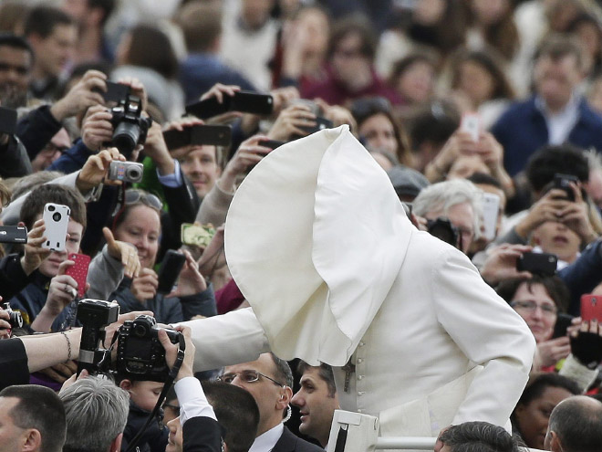 Pope vs. wind.