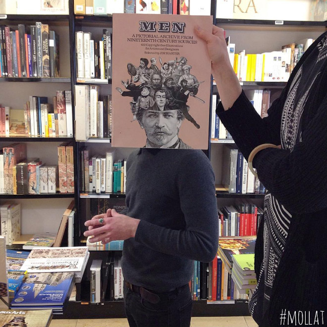 Bookstore employee having some fun.