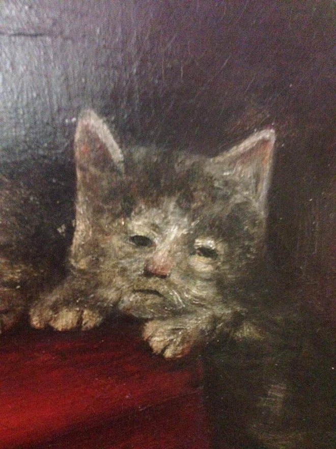 Ugly medieval painting of a cat.