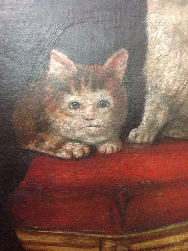 Ugly medieval painting of a cat.