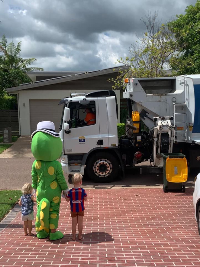 Taking out the trash in a costume.