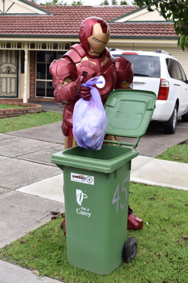 Taking out the trash in a costume.