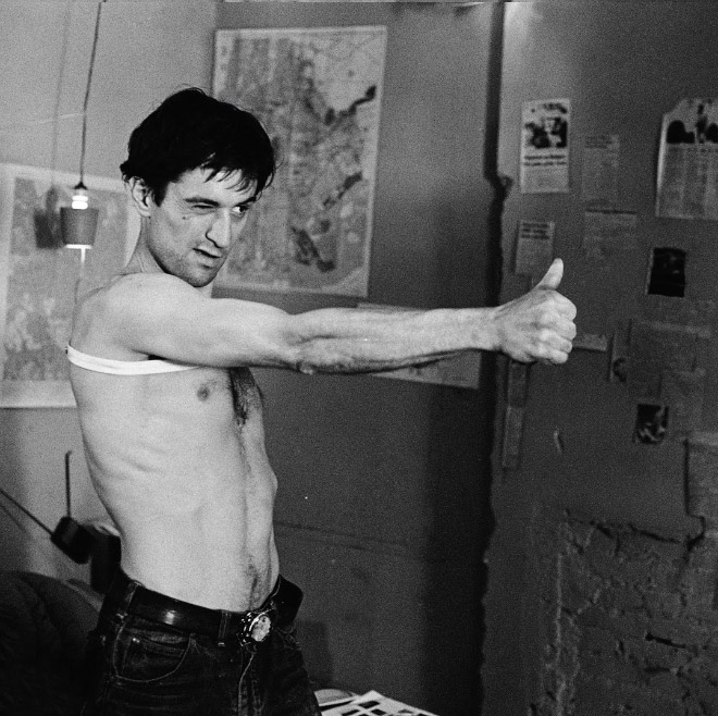 Guns replaced with thumbs-up.