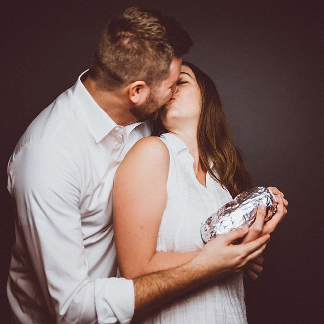 Happy young baby burrito parents.