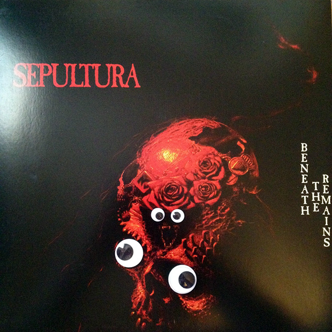 Heavy metal album with googly eyes.