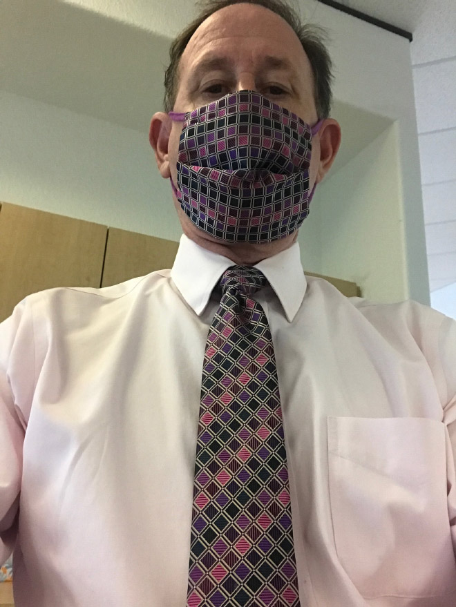 Mask matched with a tie.