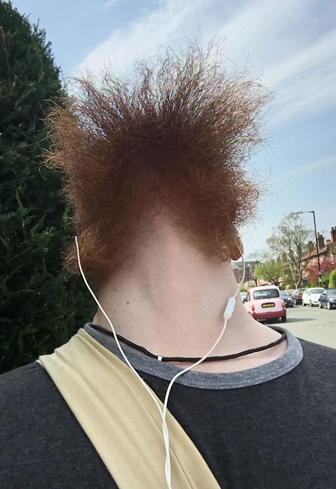 Man revealing his under beard face.