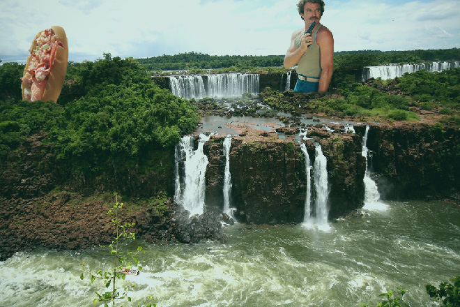 Tom Selleck hanging out with a sandwich in a waterfall.