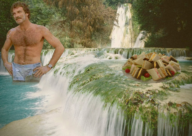 Tom Selleck hanging out with a sandwich in a waterfall.