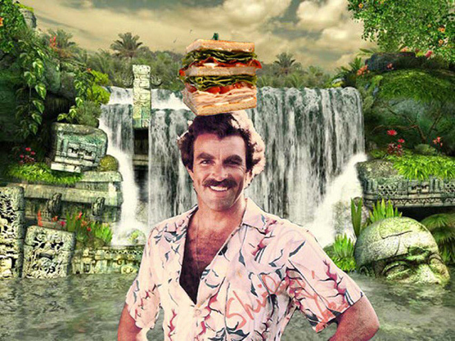 Tom Selleck hanging out with a sandwich in a waterfall.