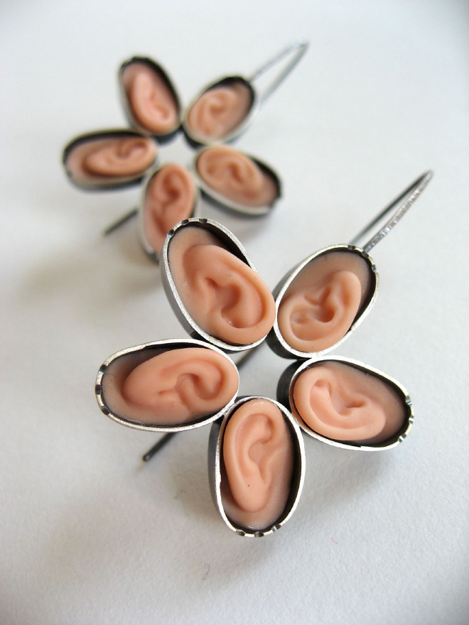 Jewelry made from chopped up Barbie parts.