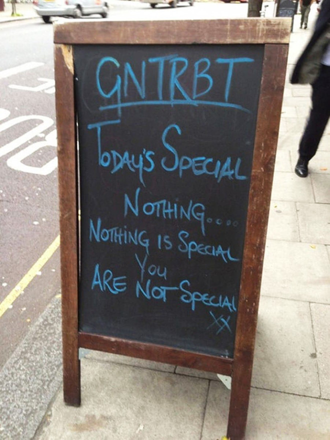 Funny restaurant sidewalk sign.