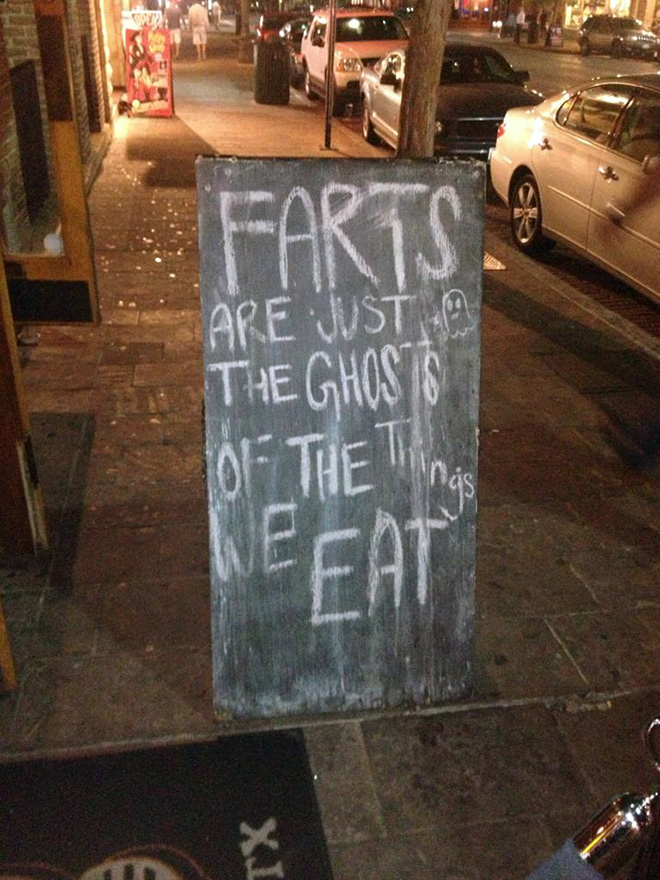 Funny restaurant sidewalk sign.