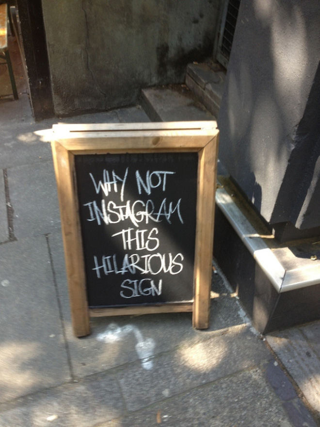 Funny restaurant sidewalk sign.