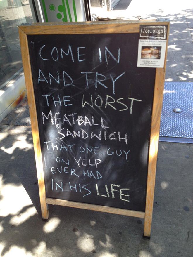 Funny restaurant sidewalk sign.