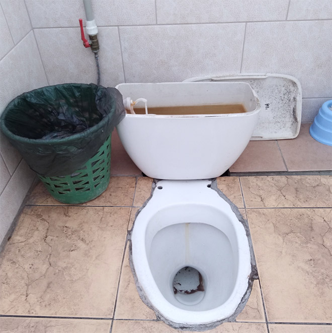 An actual toilet in a Russian school.