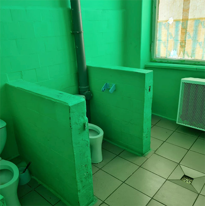 An actual toilet in a Russian school.