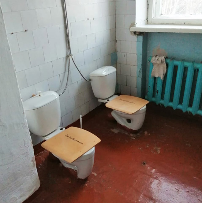 An actual toilet in a Russian school.