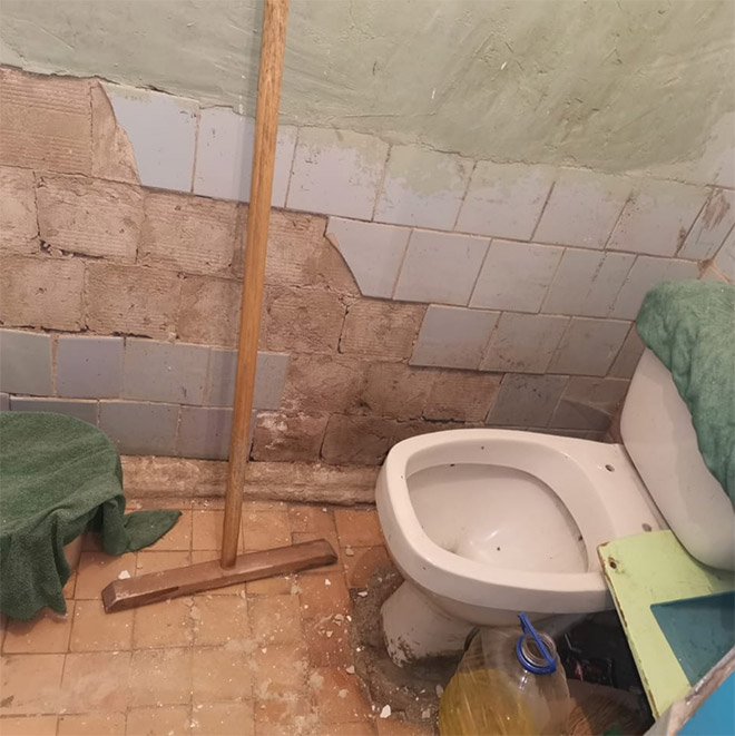 An actual toilet in a Russian school.