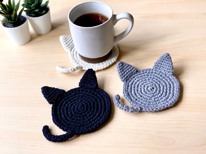 Crochet cat butt coasters.