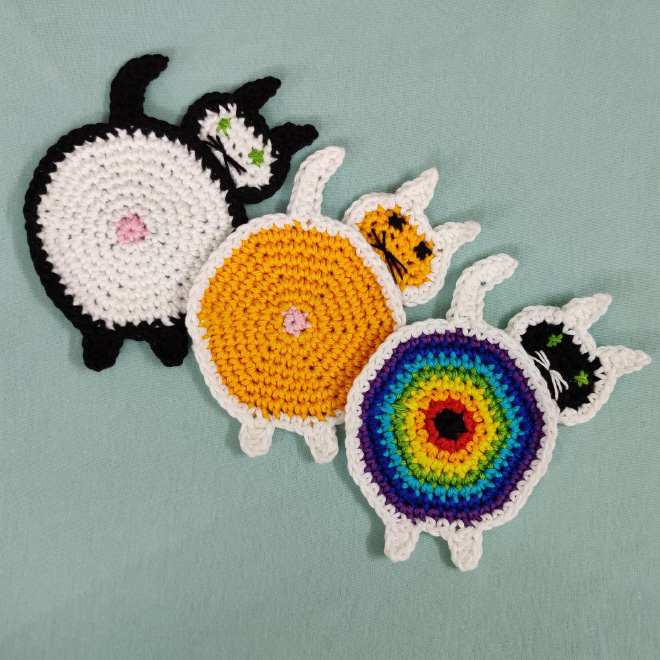 Crochet cat butt coasters.