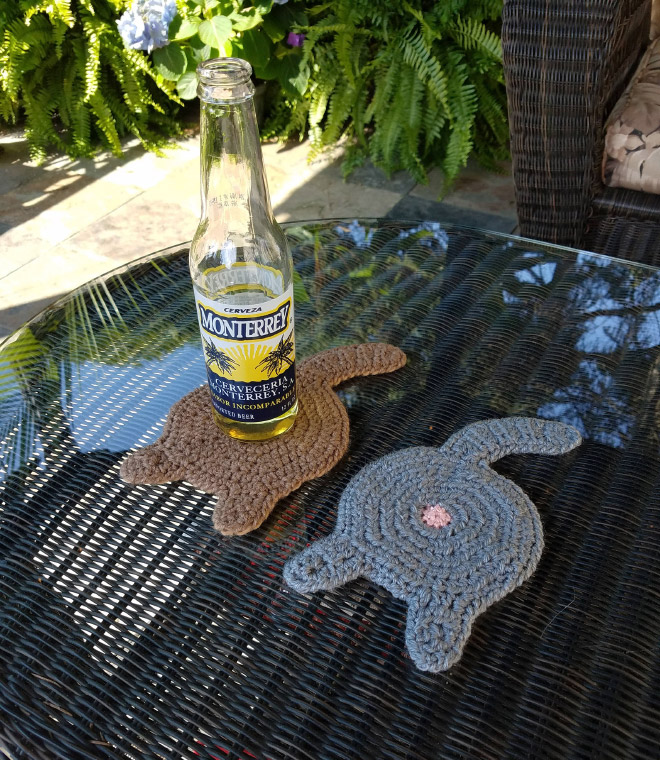 Crochet cat butt coasters.