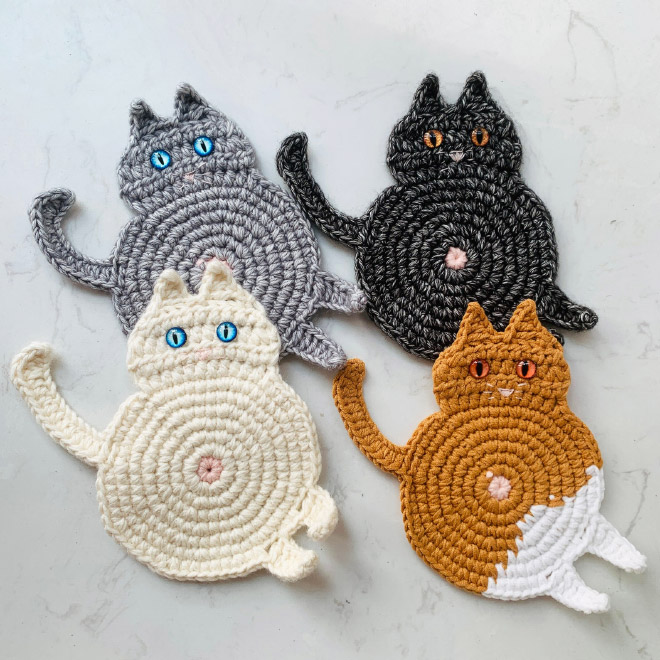 Crochet cat butt coasters.