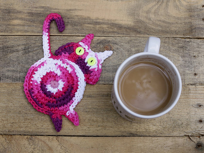 Crochet cat butt coaster.